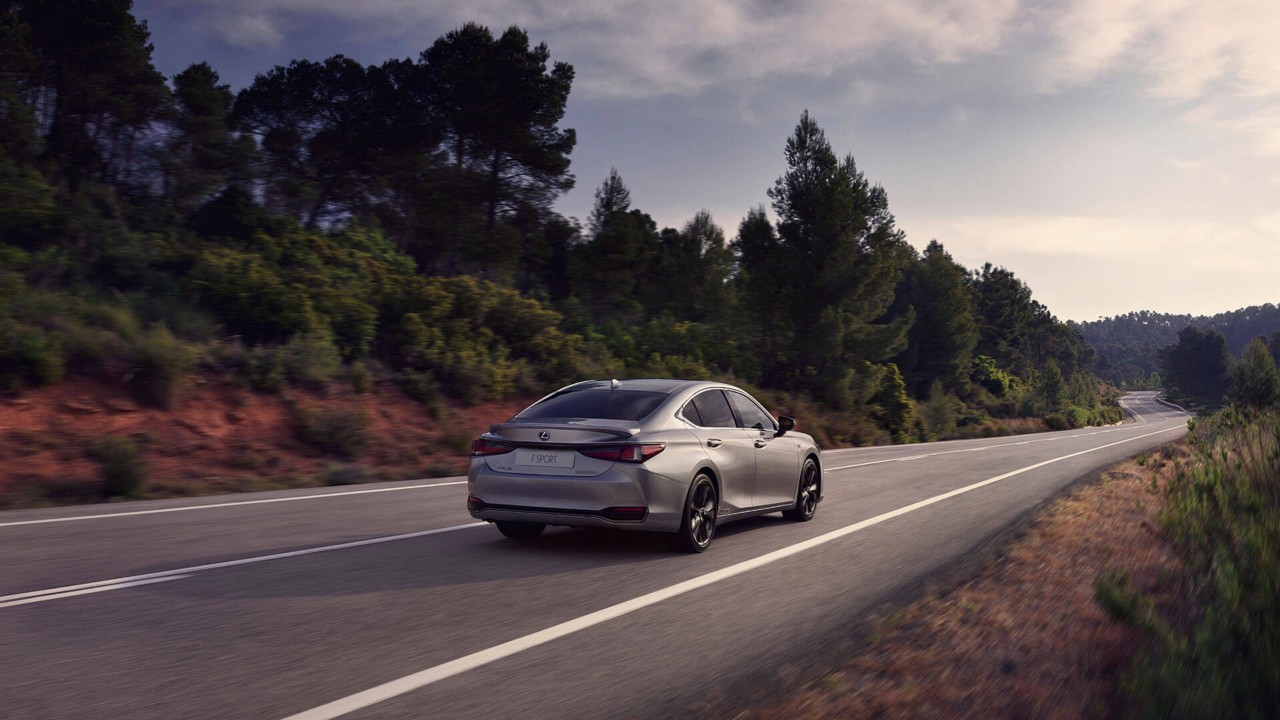 Lexus ES F Sport driving through a rural location 