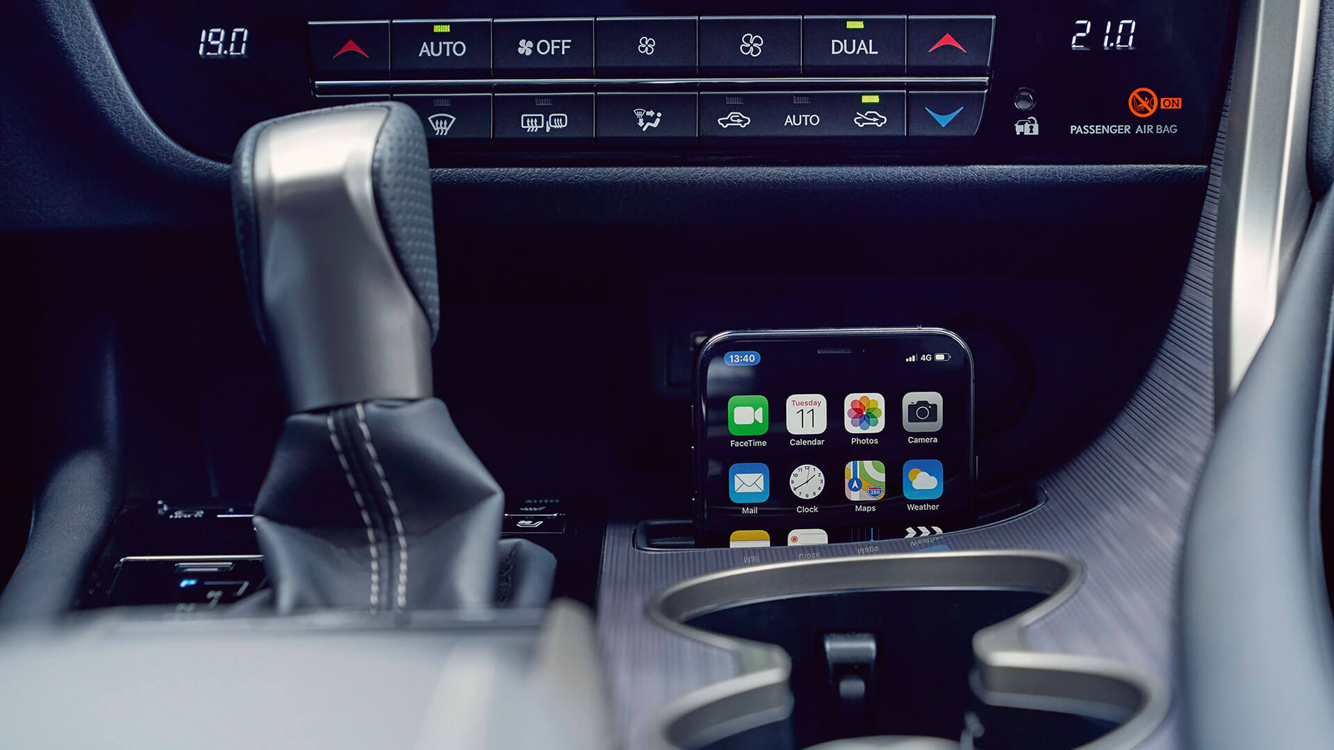 An iPhone highlighting the Lexus' Apple CarPlay or Android Auto feature 